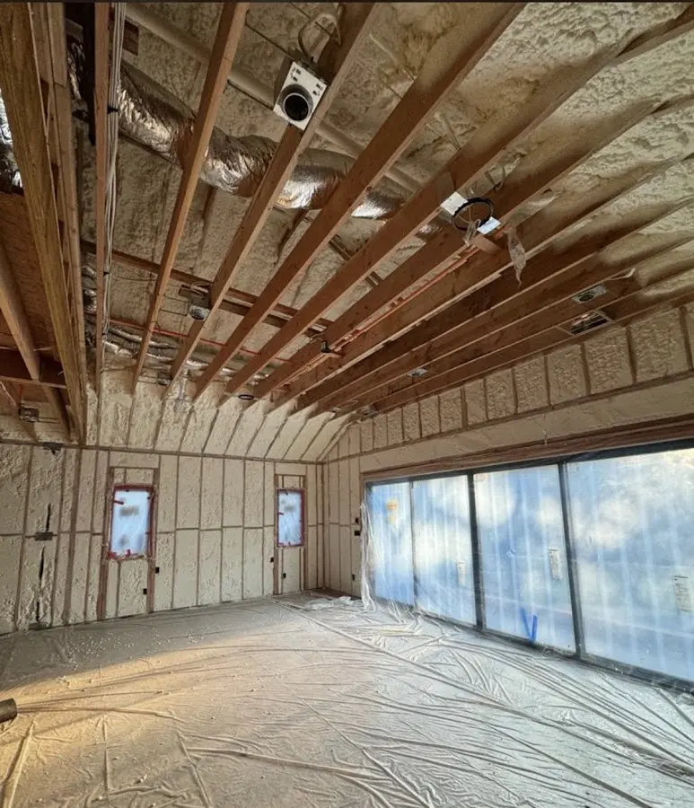 Interior walls and ceiling insulated with spray foam during new construction in Catalina Foothills